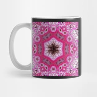 A pink snowflake-like kaleidoscope Mug